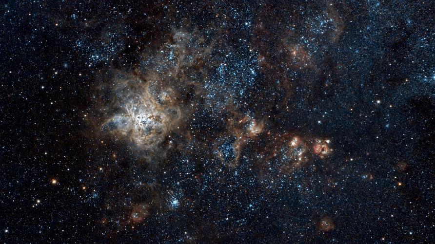 Astrophysik: Der Tarantelnebel - Jedes Objekt im Weltall zieht jedes andere an. +++++++

The Tarantula Nebula is an H II region within the Large Magellanic Cloud (LMC), a nearby galaxy to our own Milky Way.

This shot was captured from my suburban Sydney backyard on 6th December 2013 on an infrared modified Canon 550D & Orion ED80T Carbon Fibre Telescope and is made up of only 65 minutes worth of data. The sub-exposures were made up of the following:
