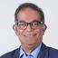 Amitav Acharya: Der 1962 im indischen Cuttack geborene Politikwissenschaftler gilt als Vordenker eines selbstbewussteren Asiens. Er hat unter anderem an der National University of Singapore und in Harvard gelehrt; derzeit unterrichtet er Internationale Beziehungen an Universitäten in Washington und Taipeh.  ++++++++++++ Dr. Amitav Acharya is the UNESCO Chair in Transnational Challenges and Governance and Distinguished Professor at the School of International Service, American University, Washington, DC. He will be in residence at TSE for the 2021-22 academic year as a Visiting TSE Chair Professor. Previously he was a Professor at York University, Toronto, and the Chair in Global Governance at the University of Bristol, U.K. He held the inaugural Nelson Mandela Visiting Professorship in International Relations at Rhodes University, South Africa in 2012- 13 and the inaugural Boeing Company Chair in International Relations at the Schwarzman Scholars Program at Tsing Hua University in 2016-18. In addition, he was a Fellow of Harvard’s Asia Center and John F. Kennedy School of Government, and was elected to the Christensen Fellowship at Oxford.

His books include Constructing Global Order (Cambridge 2018); The End of American World Order (2nd edn, Polity 2018); Why Govern? Rethinking Demand and Progress in Global Governance (editor, Cambridge 2016); The Making of Southeast Asia (Cornell 2013); Whose Ideas Matter? (Cornell 2009); and Constructing a Security Community in Southeast Asia (3rd edn, Routledge 2014). His essays have appeared in leading international affairs journals such as International Organization, International Security, International Studies Quarterly, Journal of Asian Studies, Foreign Affairs, Journal of Peace Research, International Affairs, and World Politics. He has written op-eds for Financial Times, Washington Post (Monkey Cage), Times of India, Australian Financial Review, and other newspapers around the world, and appeared on news media such as CNN International, BBC TV and BBC World Service Radio.

Acharya is the first non-Western scholar to be elected (for 2014-15) as the President of the International Studies Association (ISA), the largest and most influential global network in international studies. He is a two-time winner of ISA’s Distinguished Scholar Awards one for his “exceptional and sustained contribution to global South international studies”, as well as his contribution to “inclusion” in international studies, and another for his contribution to the study of international organization that recognizes “scholars of exceptional merit…whose influence, intellectual works and mentorship will likely continue to impact the field for years to come”.