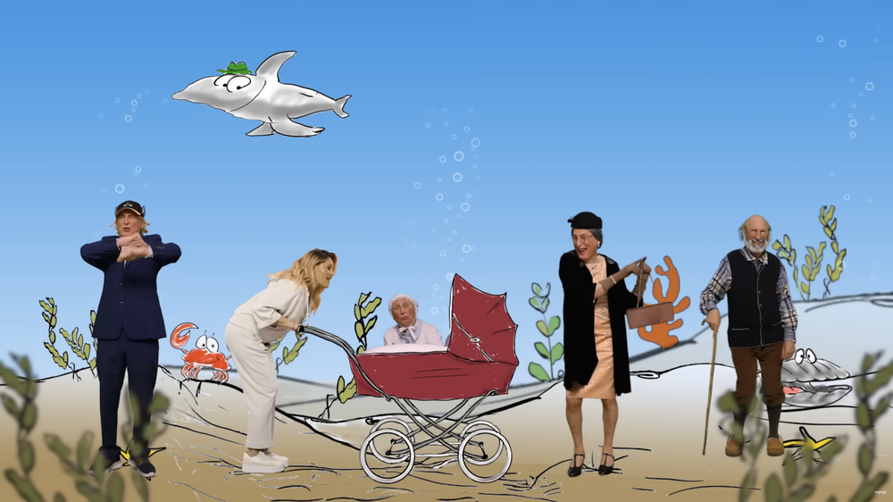Kindermusik: Zu einer Hälfte besteht der Song aus der Aufzählung einer Hai-Familie, in der anderen Hälfte wird immer wieder "Dududu" (dt. "Düdüdü") geträllert.