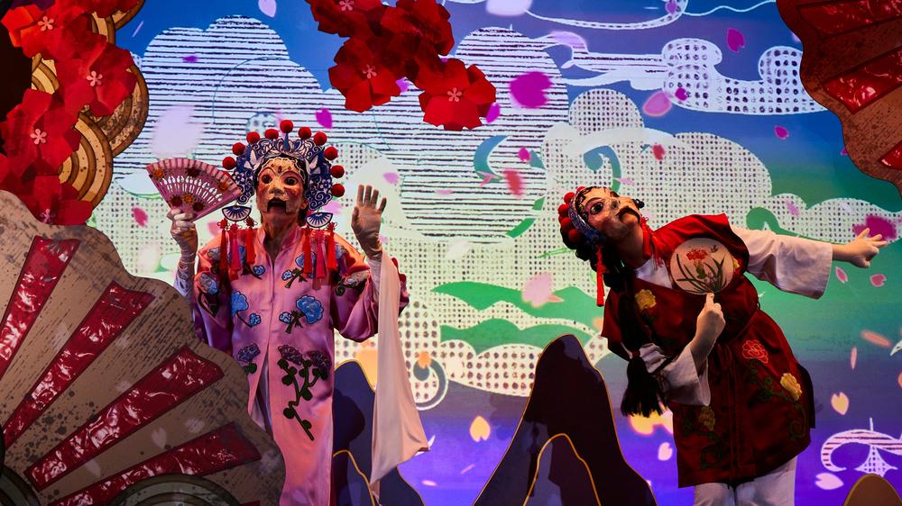 "You have to decide!": "You have to decide!" also plays with the satire of a Peking opera.