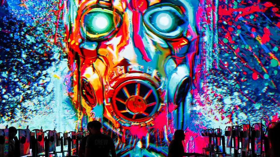 Terrorismus: Computer auf der Games-Messe E3, über ihnen ein Bild des Spiels "Borderlands 3"