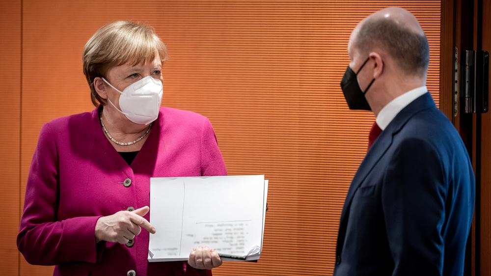 Bilanzskandal: Bundeskanzlerin Angela Merkel (CDU) und ihr Vizekanzler und Finanzminister Olaf Scholz (SPD)