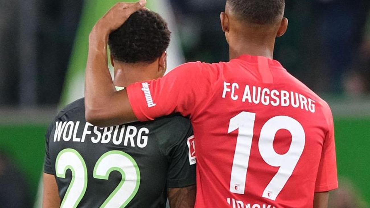 Bundesliga Wolfsburg Feels Wear And Tear Augsburg S Point For