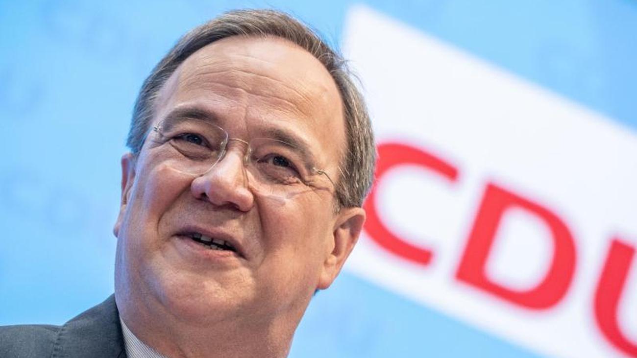 Parteien: Unions-Kanzlerkandidat Laschet holt Merz in ...