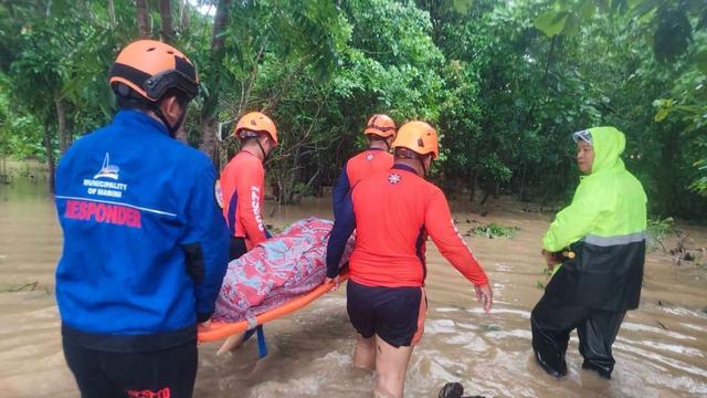Bild: Unwetter: Tote auf den Philippinen durch Tropenstürme und Monsun
