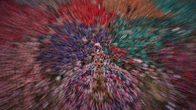 Fotografie: Mitglieder der Castellers-Gruppe „Colla Vella“ bilden ein „Castell“ – einen Menschenturm – während des 30. „Concurs de Castells“, des Menschenturm-Wettbewerbs in Tarragona in Spanien.