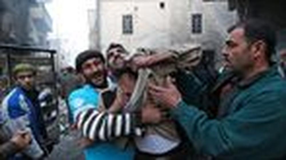 Syrien-Konflikt: Ein Vater reagiert in Aleppo auf den Tod zwei seiner Kinder.