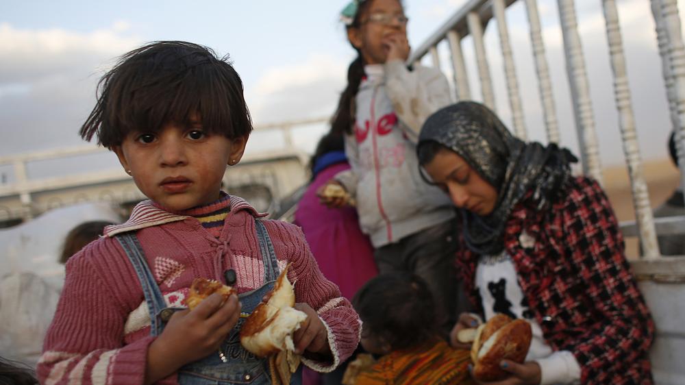  Kurdische Flüchtlinge an der syrisch-türkischen Grenze