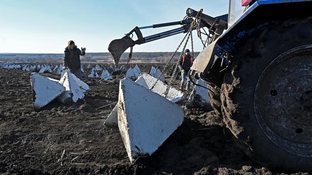 Ukraine-Krieg: Graben, um zu überleben