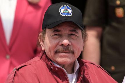 Nicaragua: Nicaragua's President Daniel Ortega looks on next to Venezuela's President Nicolas Maduro (out of frame) upon his arrival at the Miraflores presidential palace in Caracas on April 24, 2024. The presidents of Nicaragua, Daniel Ortega; Cuba, Miguel Diaz-Canel; and Bolivia, Luis Arce, arrived in Venezuela to participate in the summit of the Bolivarian Alliance for the Peoples of Our America (ALBA) bloc. (Photo by JUAN BARRETO / AFP) (Photo by JUAN BARRETO/AFP via Getty Images)