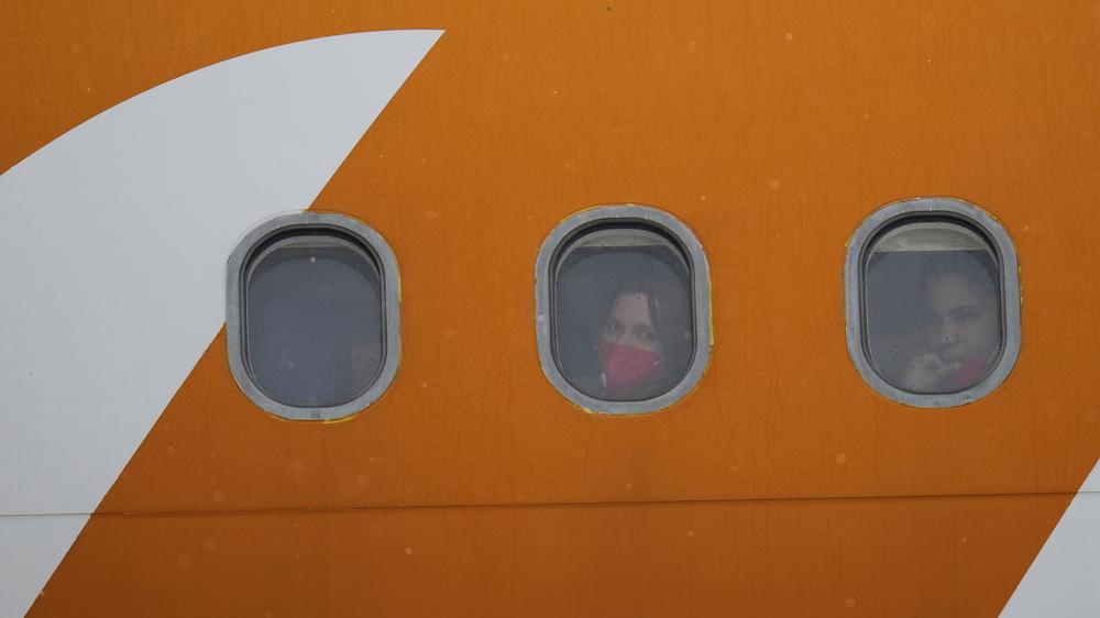  Aus den Vereinigten Staaten abgeschobene venezolanische Migranten nach der Landung in Venezuela