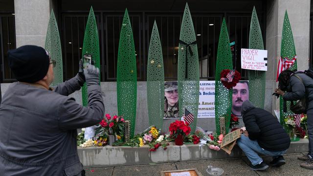 Washington guards shot, asylum suspended