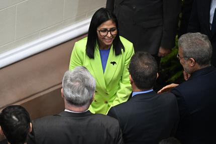 Venezuela: Venezuela's interim President Delcy Rodriguez greets ambassadors before delivering a speech to Parliament at the National Assembly in Caracas on January 15, 2026. US President Donald Trump is scheduled to meet on January 15 with Venezuelan opposition leader Maria Corina Machado, whose pro-democracy movement he has sidelined since toppling her country's leader, and whose Nobel Peace Prize he openly envies. (Photo by Federico PARRA / AFP via Getty Images)