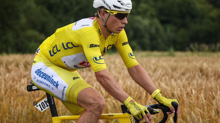 Tour de France: Alpecin - Deceuninck team's Belgian rider Jasper Philipsen wearing the overall leader's yellow jersey cycles during the 2nd stage of the 112th edition of the Tour de France cycling race, 209.1 km between Lauwin-Planque and Boulogne-sur-Mer, Northern France, on July 6, 2025. (Photo by Anne-Christine POUJOULAT / AFP) (Photo by ANNE-CHRISTINE POUJOULAT/AFP via Getty Images)