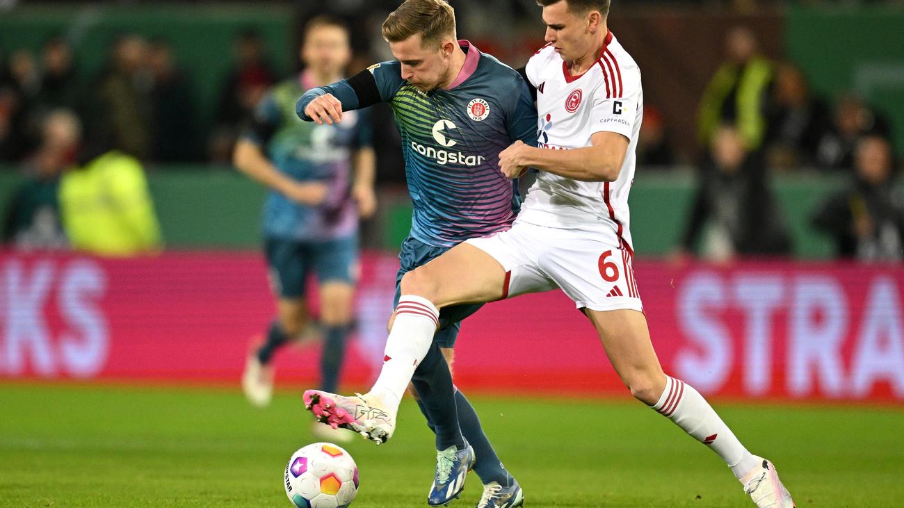 DFB-Pokal : Düsseldorf zieht nach Elfmeterschießen gegen St. Pauli ins Halbfinale