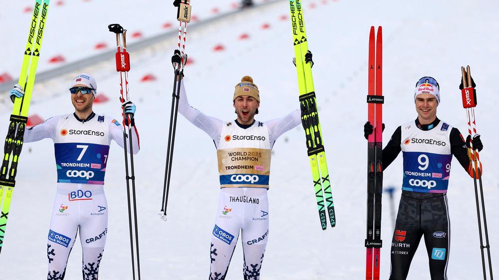 Jørgen Graabak, jarl magnus Riiber and Vinzenz Geiger celebrate their medal win