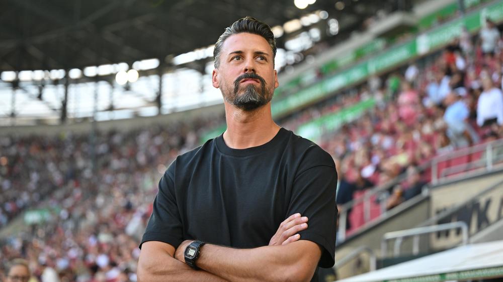 A passionate football player celebrating a goal.