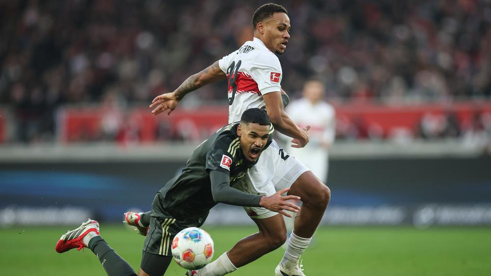 Bundesliga, 18. Spieltag - Sonntag: Stuttgarter Nikolas Nartey und Berliner Danilho Doekhi während der Partie zwischen dem VfB Stuttgart und dem 1. FC Union Berlin.