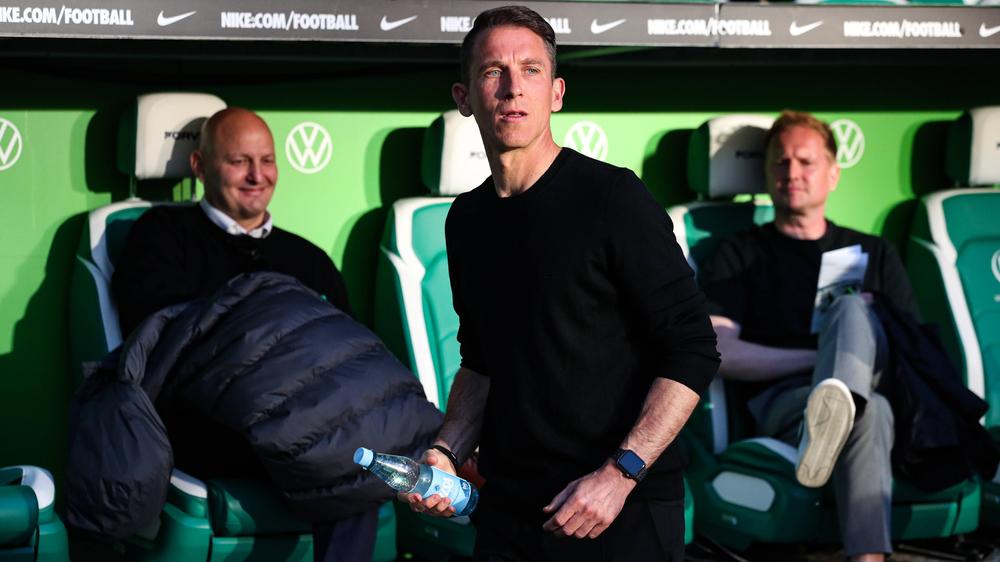 Fußballbundesliga: Daniel Bauer (vorne) und Peter Christiansen (hinten links)