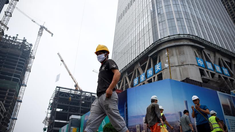 China: Arbeiter auf einer Baustelle in Peking