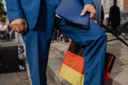 Unternehmer und die AfD: Ein Teilnehmer beim AfD-Fest in Klötze, Sachsen-Anhalt, 16. August 2026.