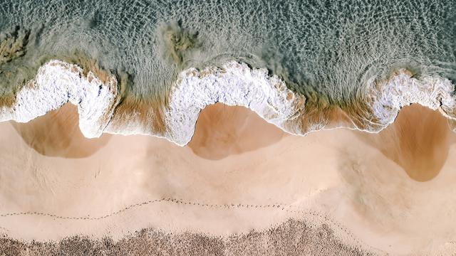 Strand: Wann wird ein Sandkorn zum Strandkorn?