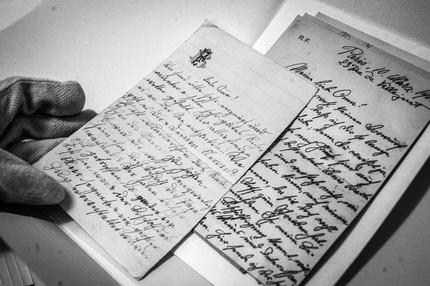 Anne Frank: Amsterdam, NETHERLANDS: Photo shows parts of the Frank-family archive that Buddy Elias, a cousin of Anne Frank, handed over fron the Anne Frank Fund to Hans Westra of the Anne Frank Foundation,  25 June 2007 in the Anne Frank Museum in Amsterdam, exactly 60 years after the first edition of the Anne Frank Diary was published. AFP PHOTO KOEN SUYK NETHERLANDS OUT (Photo credit should read KOEN SUYK/AFP via Getty Images)